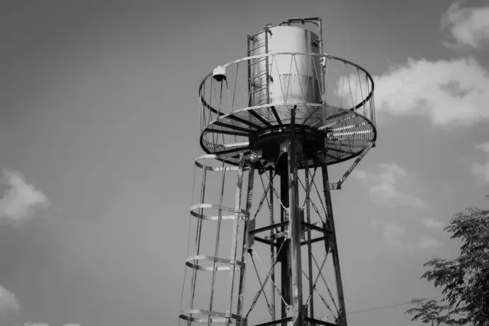 white and black metal tower